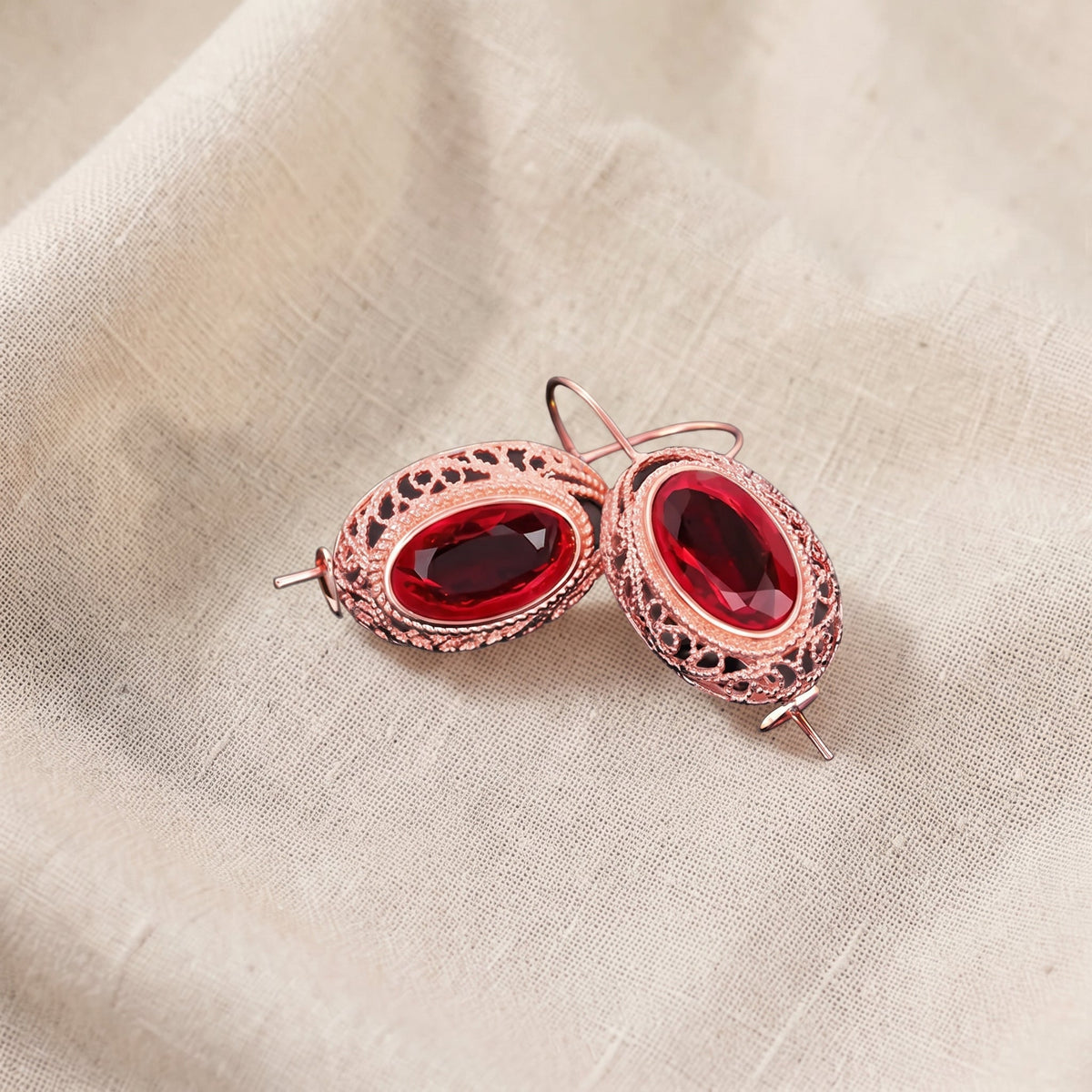 Kolczyki różowe złoto czerwony rubin